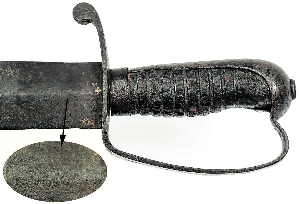 Pommel cap view of the Ferguson knife, showing the knurled capstan nut, a somewhat unique method of attaching the tang to the hilt of Confederate-made knives.