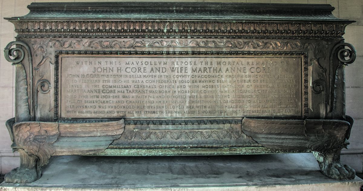 Bronze sarcophagus. “Within this mausoleum repose the mortal remains of John H. Core and Martha Anne Core.”