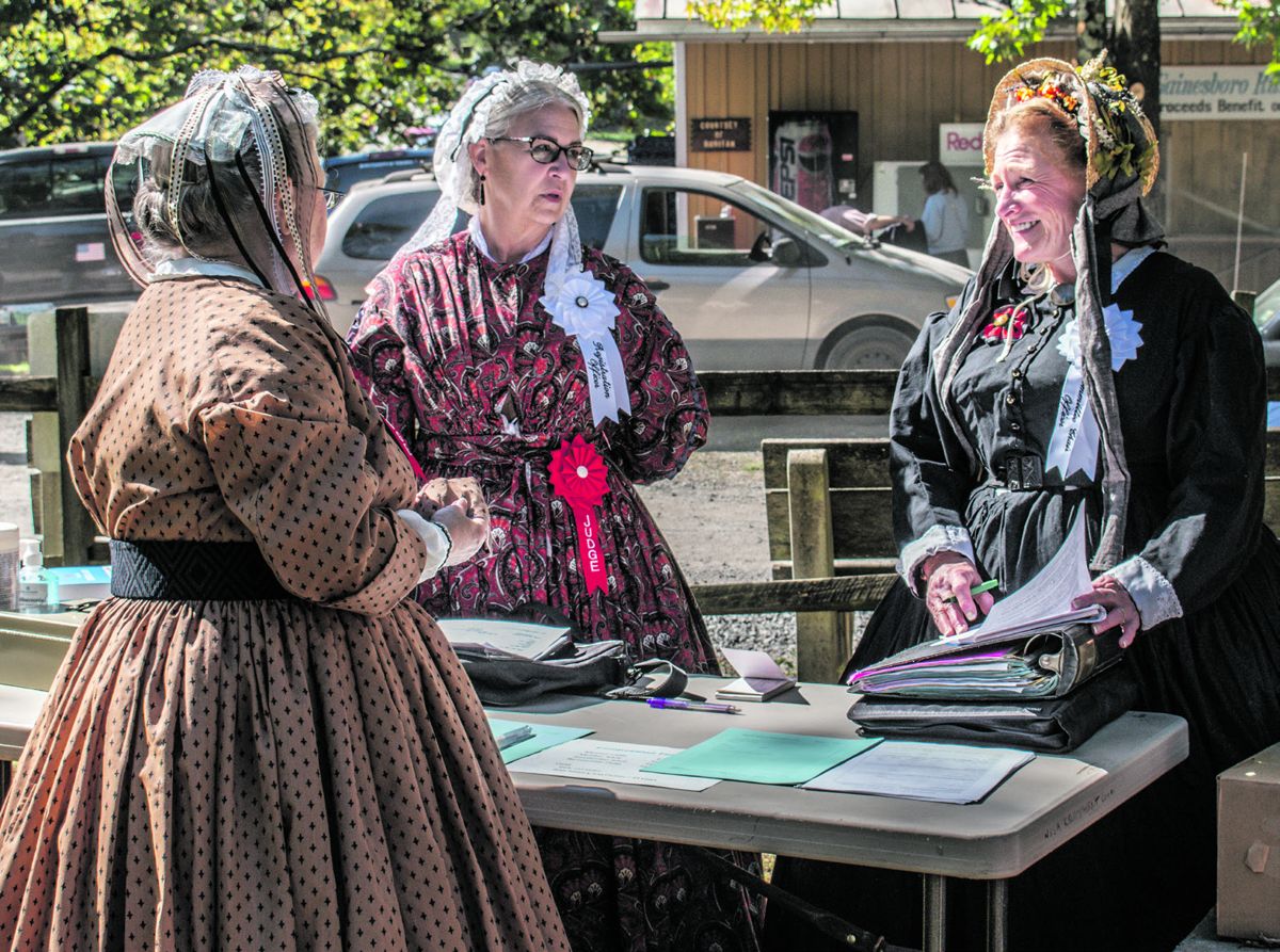 Shooting isn’t the only competition in the N-SSA. The Costume Committee holds several events and competitions. Members of the Costume Committee not only judge the authenticity and accuracy of competitors but also conduct workshops teaching proper construction of mid-nineteenth century clothing. Ericka Hoffmann Curley.