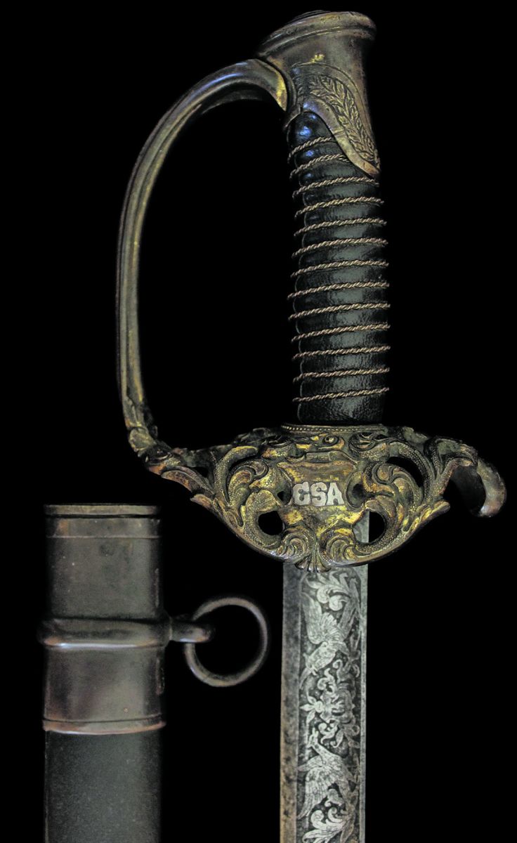 The full hilt shows much of its original gold gilt.