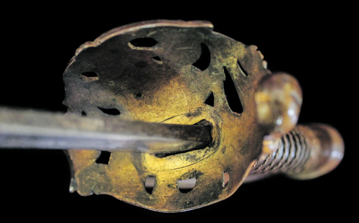 Underside of the guard showing heavy gilt.
