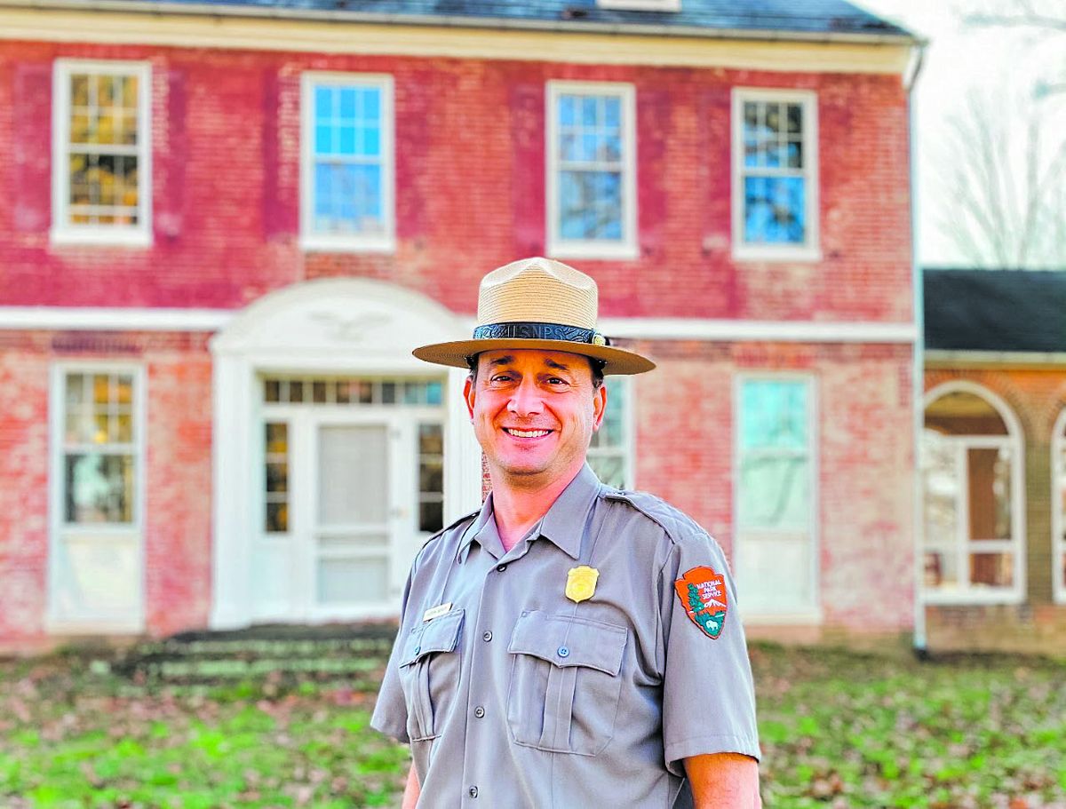 Andrew Banasik stands in front of the Thomas House at Monocacy National Battlefield. NPS Photo.