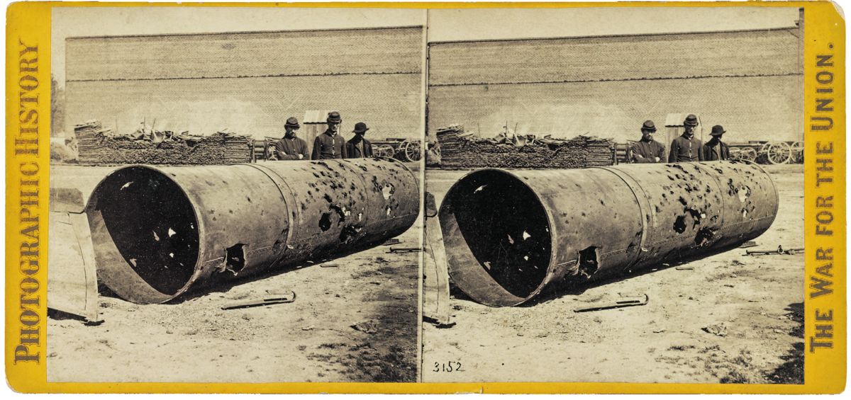 The smoke stack of the rebel ram Virginia at the Rocketts, Richmond, Va., showing the effects from shot and shell, after the return from her raid down the river.