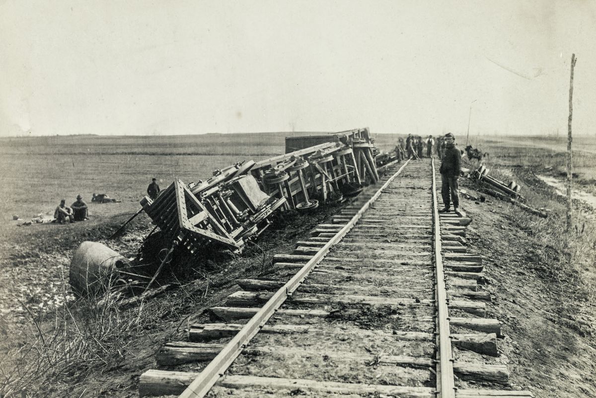 A train wreck like this one brought to light the tragedy of Lilly White. Engine Government or Commodore down the “banks” near Brandy, April 1864. Library of Congress.