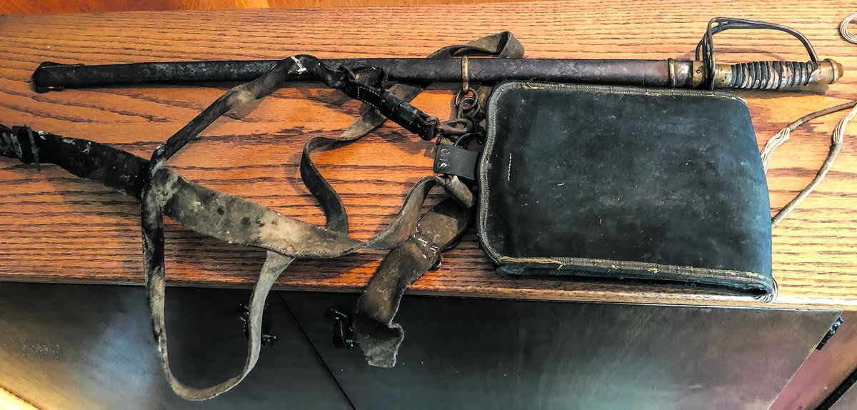 Confederate staff officer sword most likely made by firm of B. Douglas, Columbia, S.C., in “attic as found” condition with prewar militia belt and officer used valise.