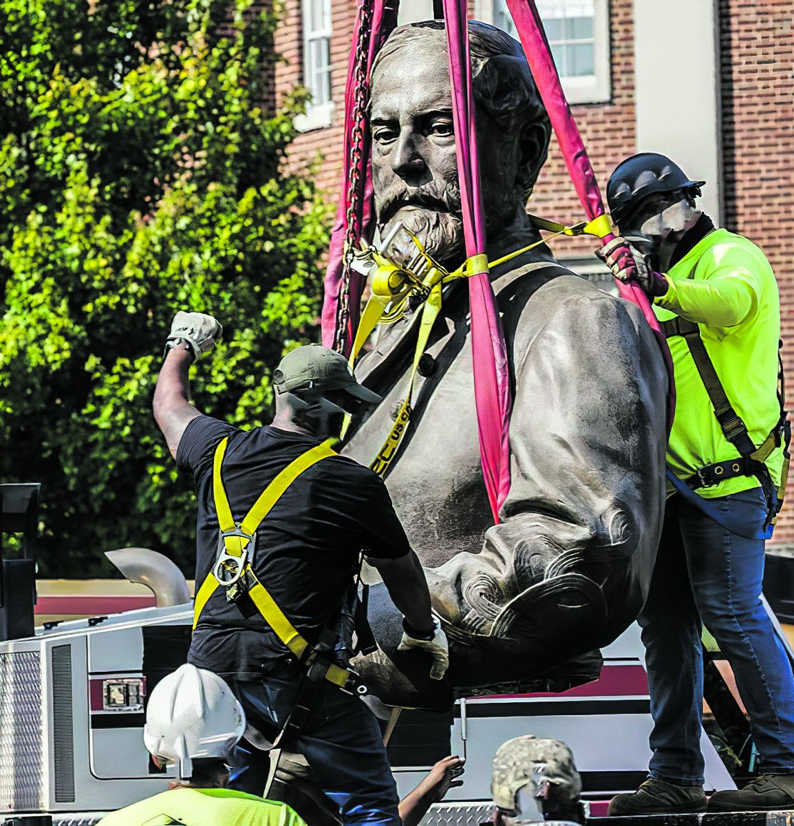 Lee’s statue was cut into at least two pieces for easier transportation through the city’s infrastructure and low hanging tree limbs.