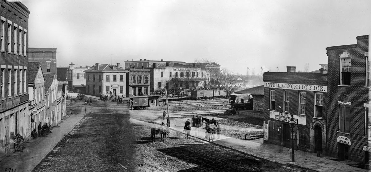 In the fall of 1864, George Barnard took several photographs looking north at the end of Whitehall Street. The Intelligencer office was located in the building to the right, above Wittgenstein’s saloon and liquor store. In the fires of November 15, this entire area was leveled. (LOC)