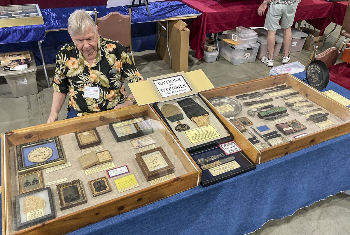 Author and collector Paul Loane displays his collection of rare Civil War rations and utensils.