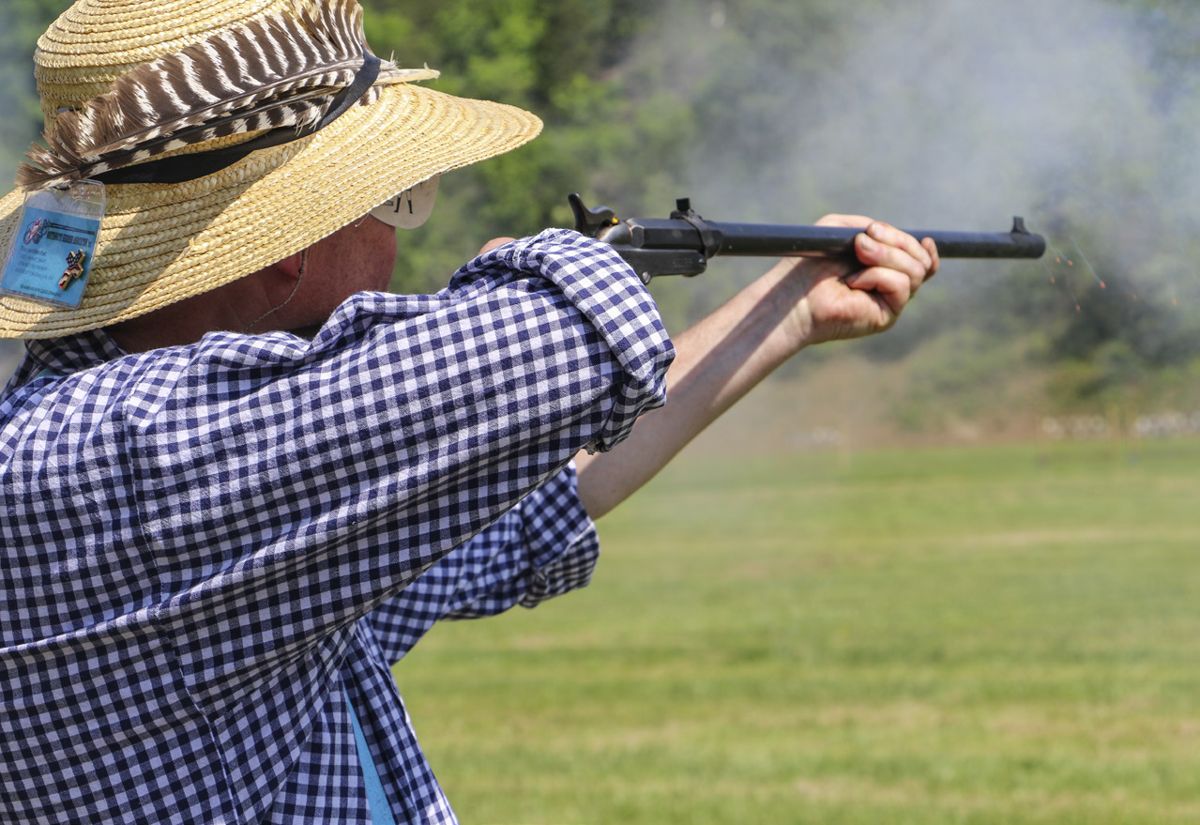 A member of the 8th Regiment Virginia Volunteer Infantry deftly fires his Maynard during the carbine team match. Sharps, Smith, and Burnside carbines are also favorites in this match. (Niki Bethke)