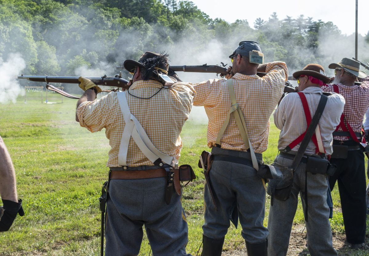 The Mosby’s Rangers musket team carefully aims and fires at four-inch hanging tiles during the musket match. A total of 138 eight-member teams competed in the 145th National Skirmish musket match. (Ericka Hoffmann Curley) Many generations of skirmishers have grown up in this sport.