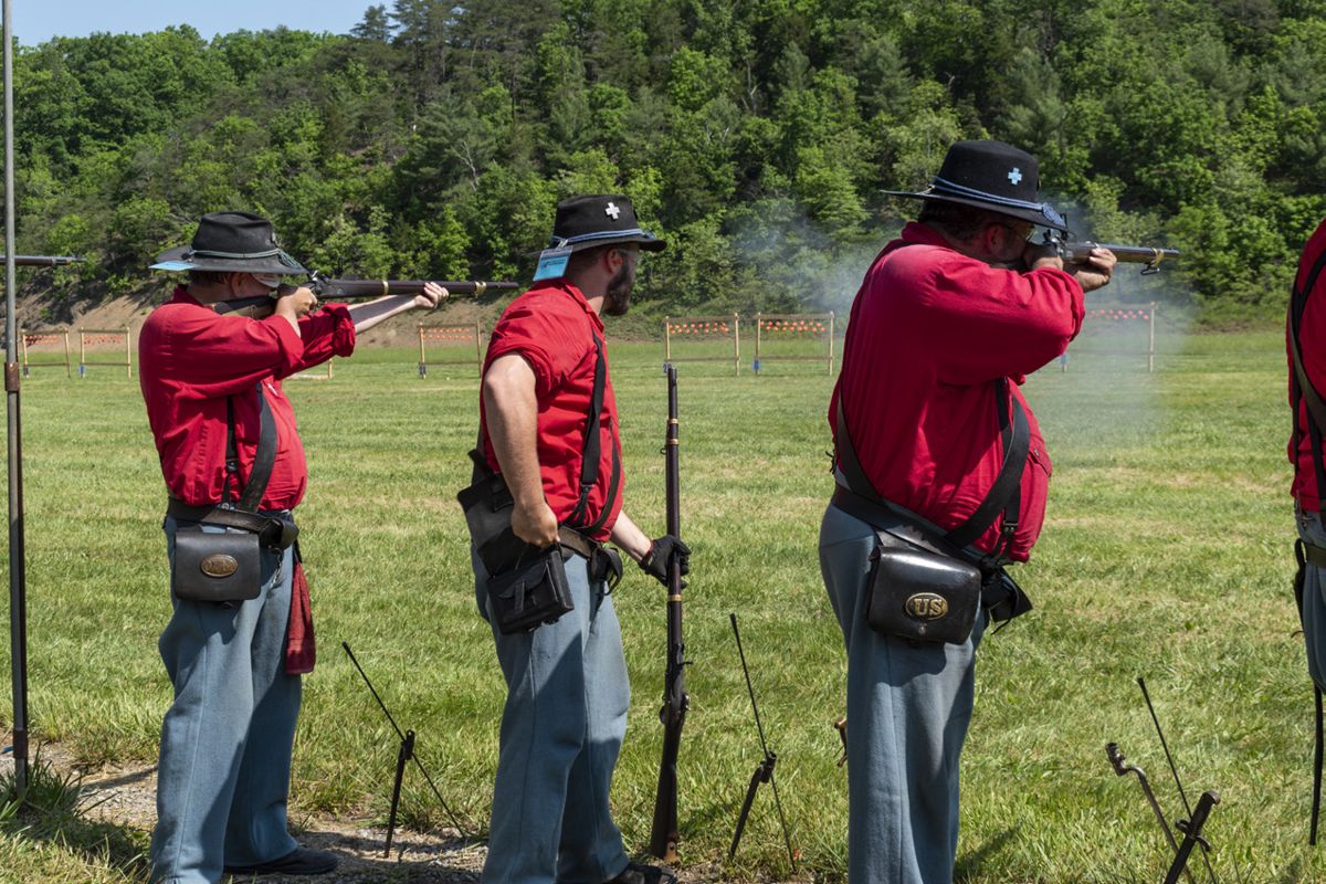Three generations of the Rouch family, who are members of the 110th Ohio Volunteer Infantry, compete in the musket match. Teams in this family-oriented organization often include multiple generations of family members. (Ericka Hoffmann Curley)