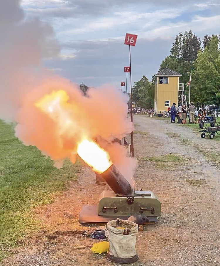Even a 12-pounder mortar, relatively small among artillery pieces, can produce an impressive muzzle blast. Staff in the main tower of the N-SSA, in the background, monitor all activity on the main range. (Niki Bethke)