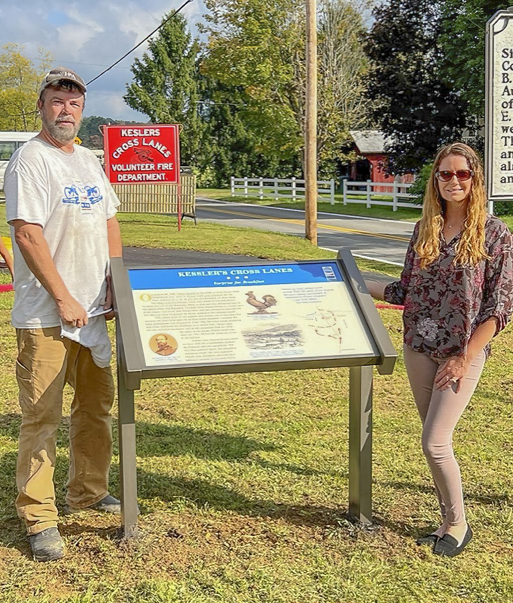 Summersville CVB Executive Director Tracy McCoy and Jason Shaffer, Operations Manager of Civil War Trails, proudly present the new Civil War Trails sign describing the Battle of Kessler’s Cross Lanes installed at the Fire Department building located at 6035 Summersville Lake Rd, Keslers Cross Lanes, WV 26675. (Courtesy, Summersville CVB) The Civil War Trails team updated the content related to ‘Nancy Hart’ whose incredible story is part fact and part mystery.