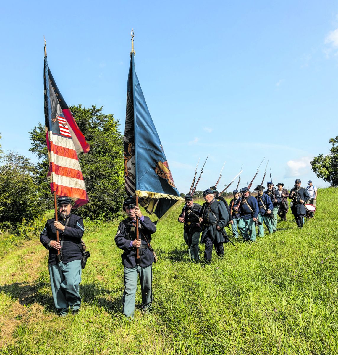 Members of the 14th and 8th Conn. marching from the Robinson House, towards Morton’s Ford on the original route taken in 1864.