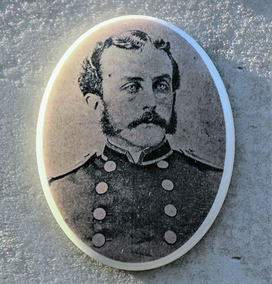 Restored medallion of Lt. Hugh McKee that graces the monument. (Charles H. Bogart)