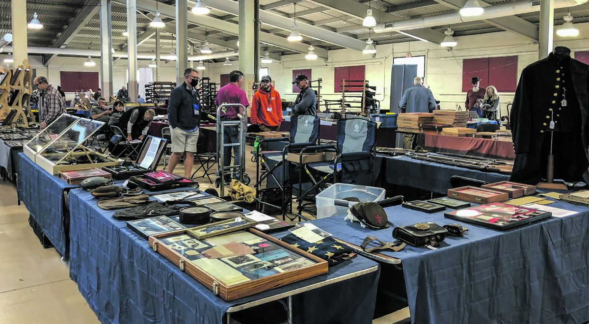 Horse Soldier proprietor Wes Small with a wide variety of relics for sale. All photos by Carl Sitherwood.