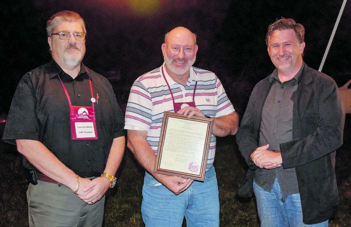 Retired NPS Supervisory Historian Gregg Mertz (center) receives proclamation. CVBT President Tom Van Winkle (left) CVBT Vice President Chris Makowski (right).