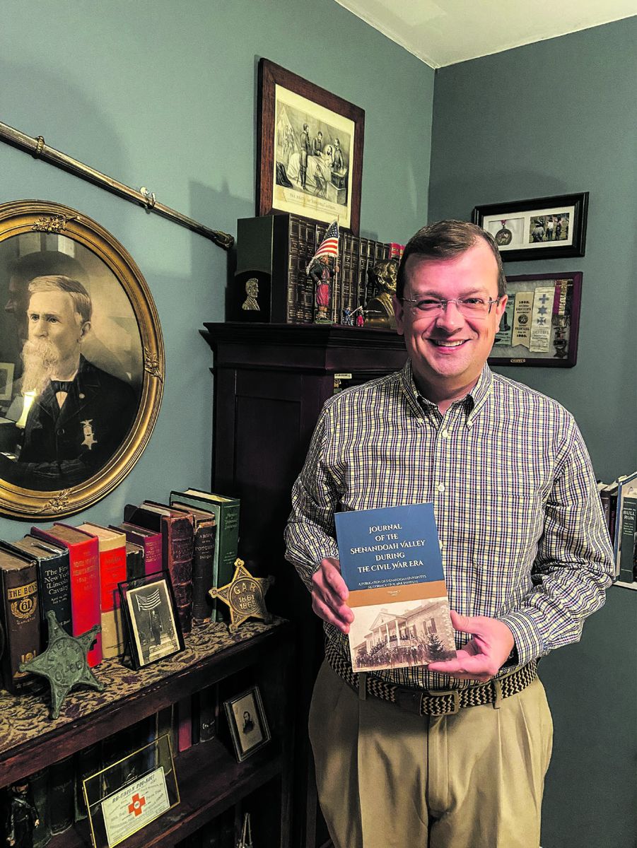 Journal Celebration: MCWI’s director Jonathan A. Noyalas holds a copy of volume 5, Journal of the Shenandoah Valley during the Civil War Era. (Photo by Brandy Noyalas)