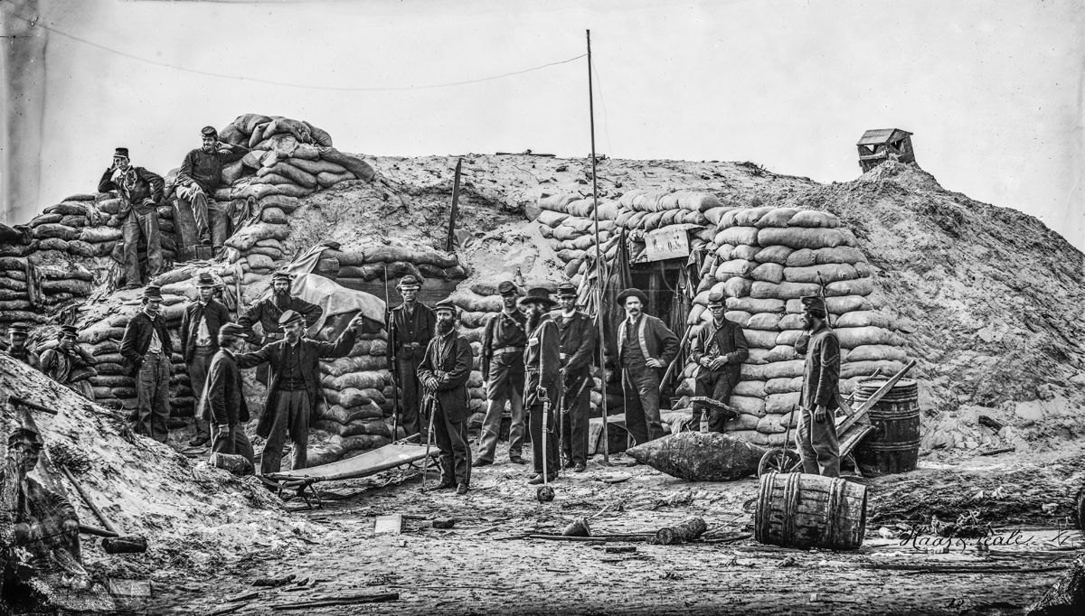 Headquarters Second Parallel. A barrel torpedo (today’s mine) and a tapered ended barrel torpedo are in the foreground on the right side of the photo. (Library of Congress) Fort Wagner and the Union approaches.