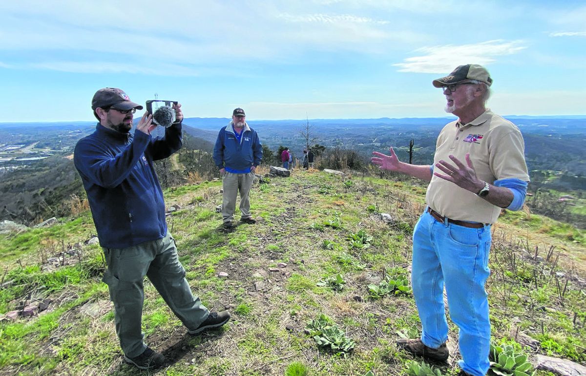 ECW Chief Historian Kris White shoots historian Will Greene atop the crest of Rocky Face Ridge in Georgia as ECW’s Dave Powell looks on.
