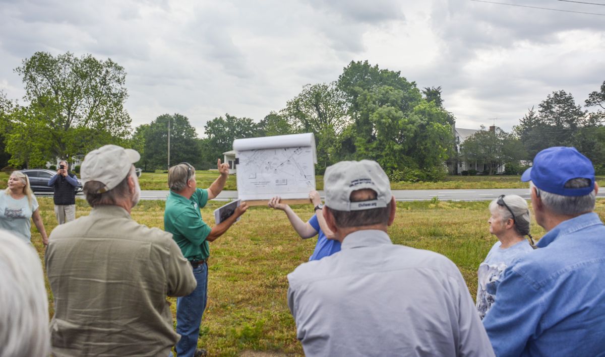 Wade Sokolosky orienting tour at First Day's fighting. The Cobb House is in the right background.