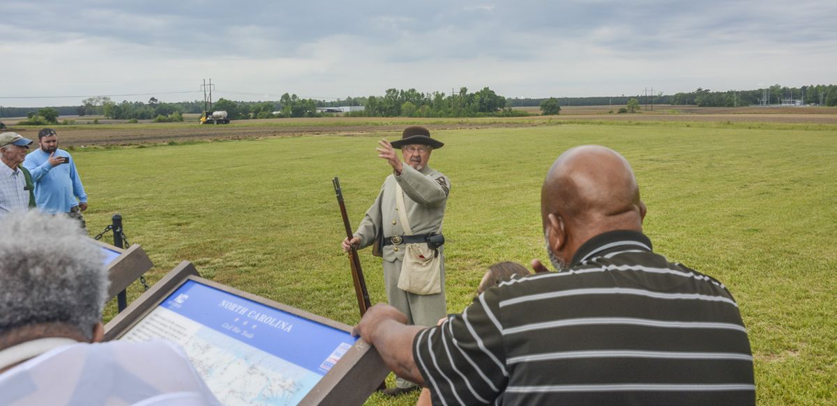 Wilbur King gestures while discussing Confederate assault that came from the left background.
