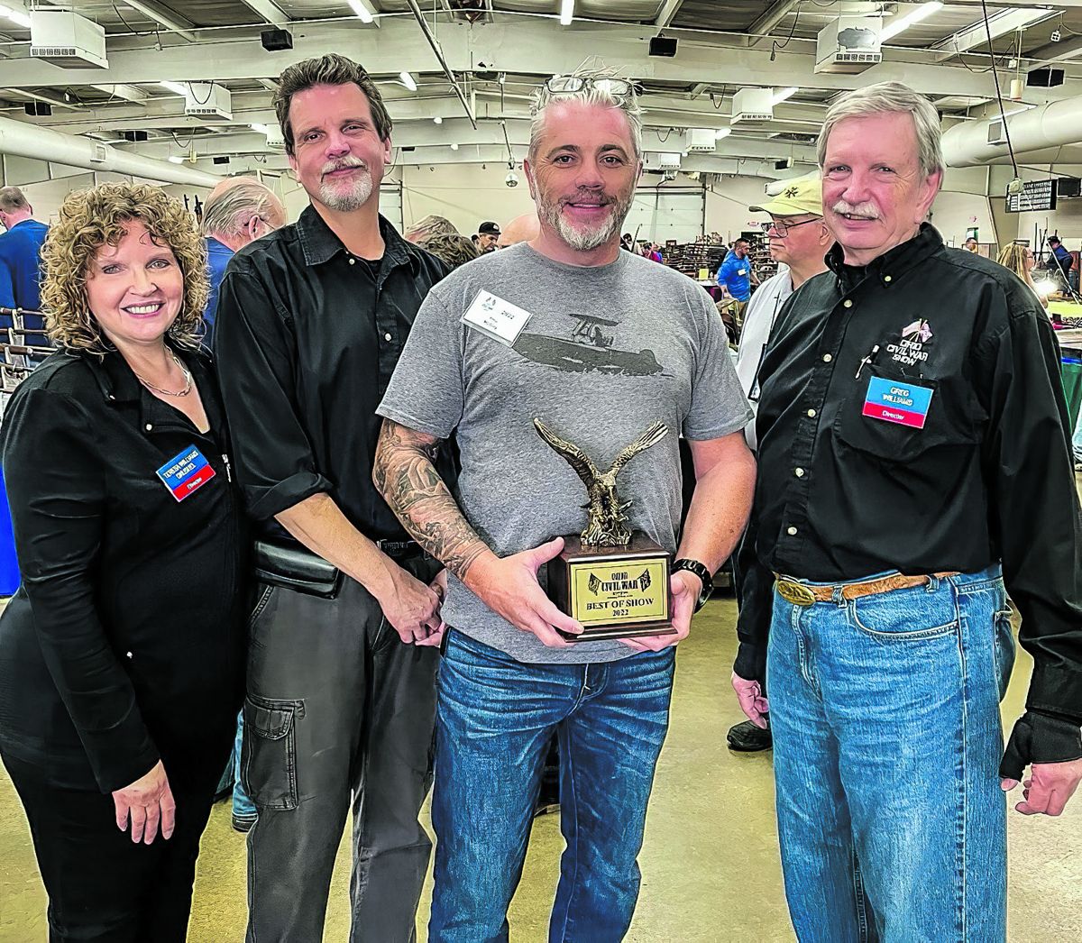 Best of Show Award – Phil McCoy (center) with Williams family Show Directors’ Teresa Drushel, Wayne Williams, and Greg Williams. (Kayley Boettner)