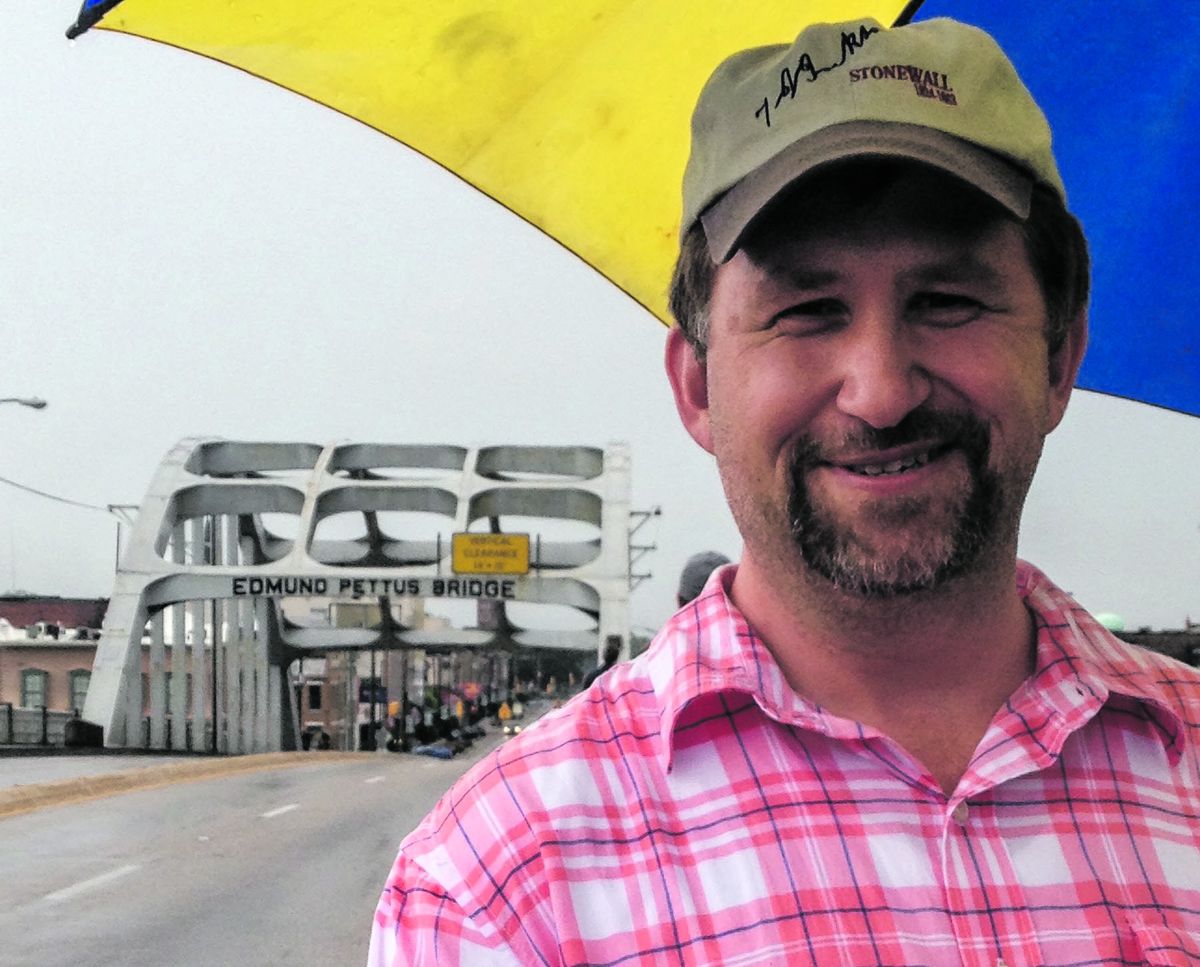 Chris Mackowski stands on the Edmund Pettus Bridge on the road out of Selma, Ala.
