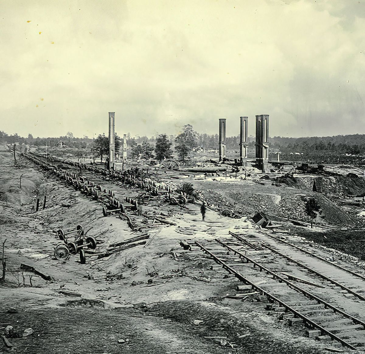 Fig. 1. Ruins of rolling mill and railroad cars destroyed by Confederates on evacuation of Atlanta, Ga.