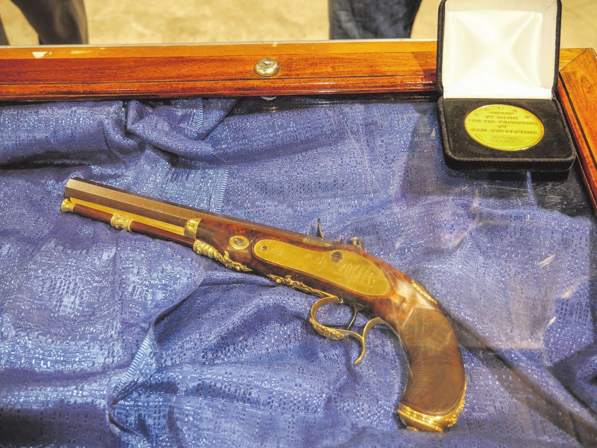 These identical gold-mounted, flintlock presentation pistols, made by Simeon North, were given to Captain Isaac Hull by his native State of Connecticut around 1818. The pistols are decorated with a side plate engraved with USS Constitution’s escape from a British squadron in July of 1812.