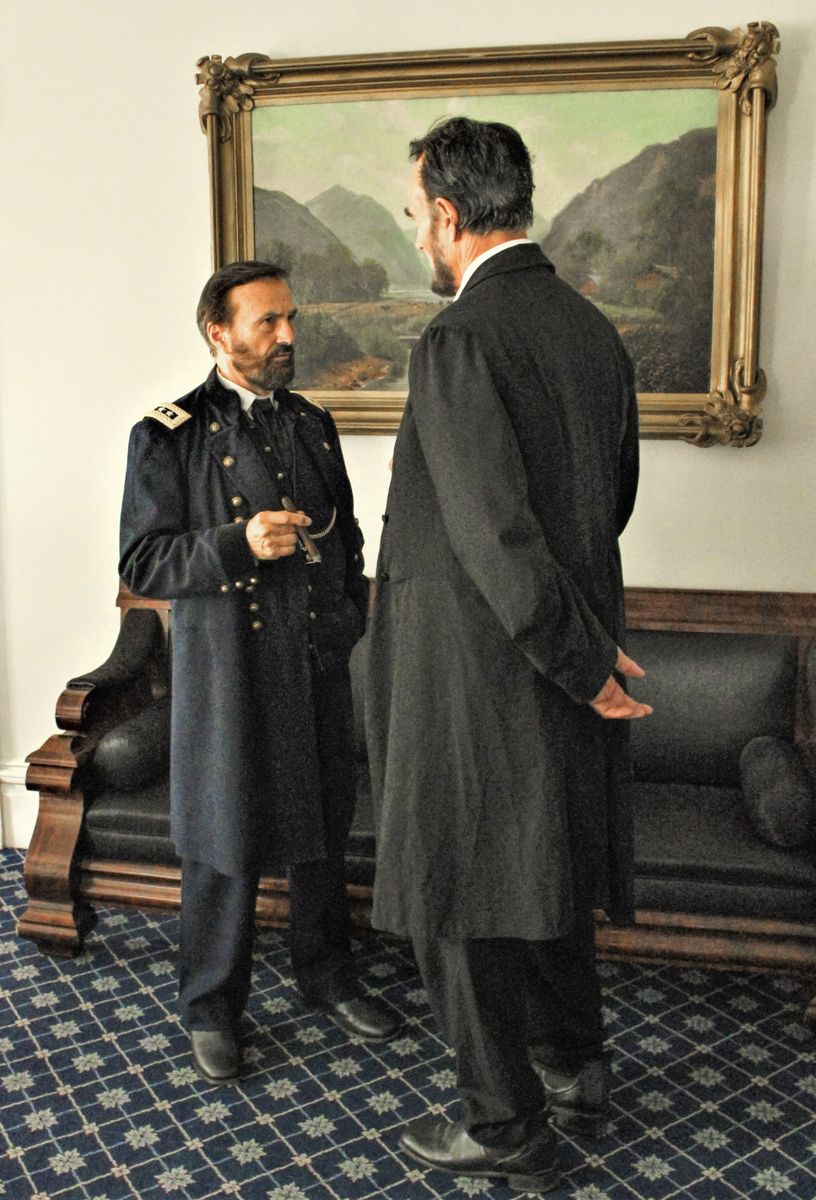 General Grant (Curt Fields) and President Lincoln (Fritz Klein) in the parlor discussing the War.