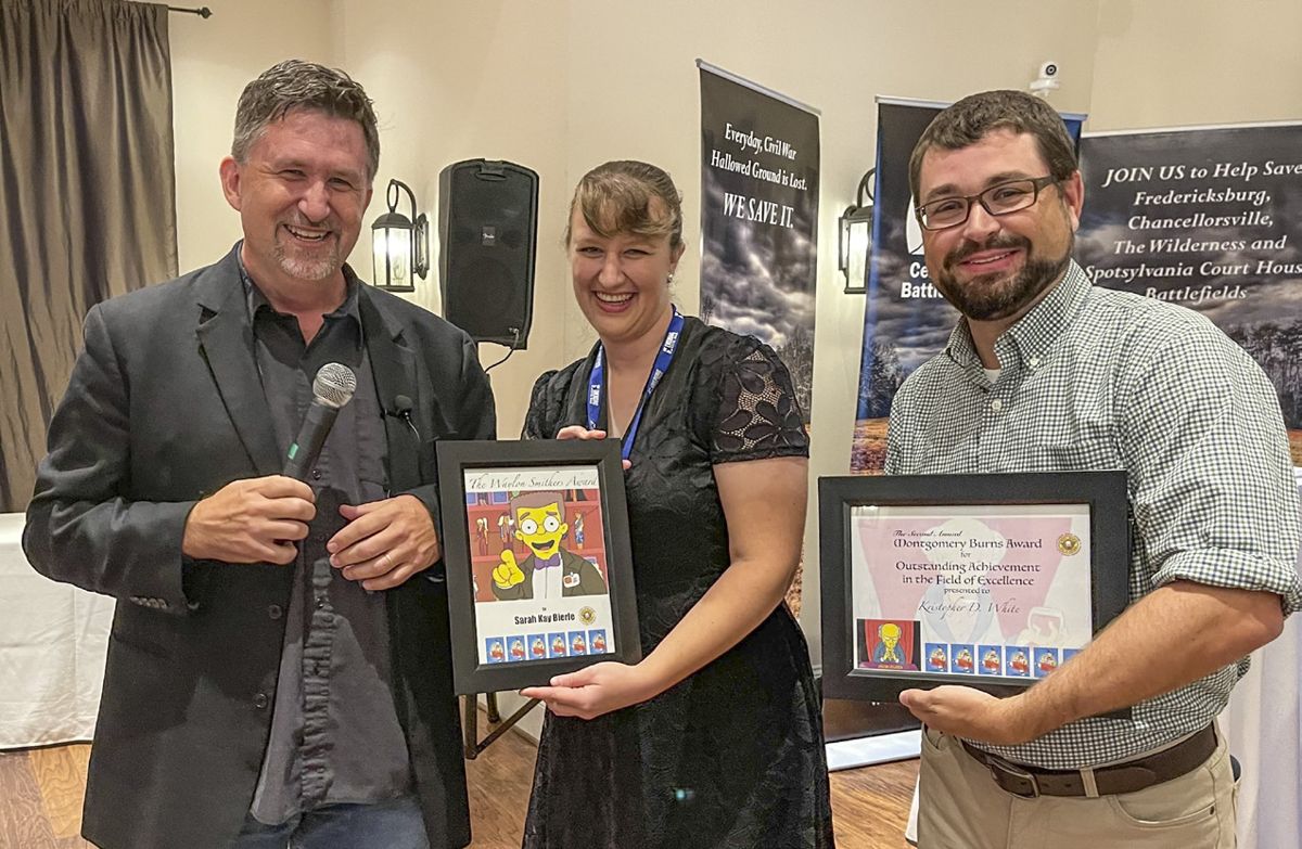 Two of ECW’s greatest American Battlefield Trust successes: Sarah Kay Bierle and Kris White, who both now work in the Education Department (along with Dan Davis, not pictured). Here, they show off special awards presented by ECW Editor-in-Chief Chris Mackowski.