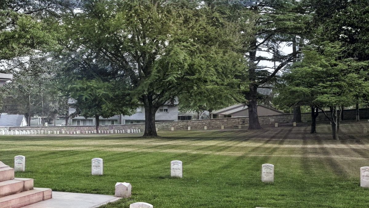 Five of Salisbury Cemetery’s 18 trenches with only headstones and footstones in the distance.