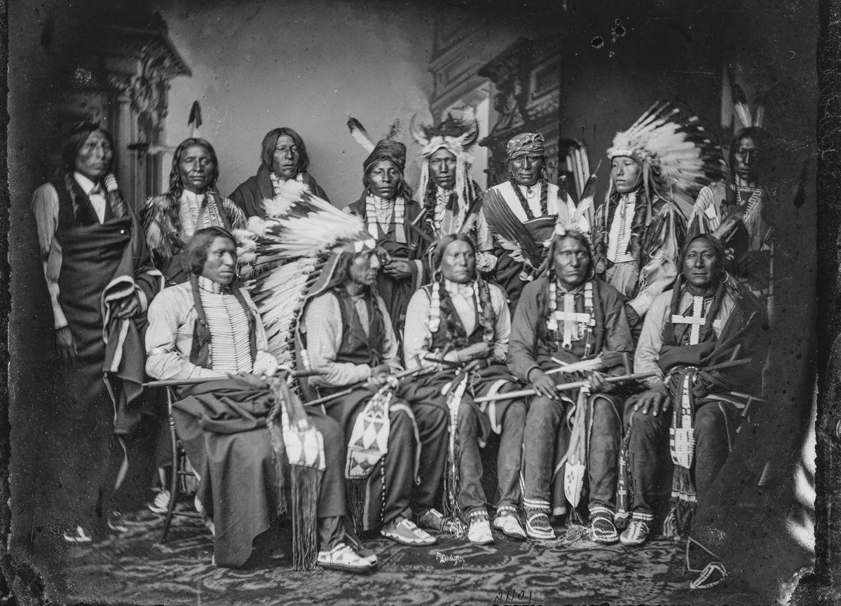Red Cloud and other Sioux Indians (taken post Civil War). Standing: Red Bear (Sons Are?), Young Man Afraid of his Horse, Good Voice, Ring Thunder, Iron Crow, White Tail, Young Spotted Tail; seated: Yellow Bear, Jack Red Cloud, Big Road, Little Wound, Black Crow. (Library of Congress)