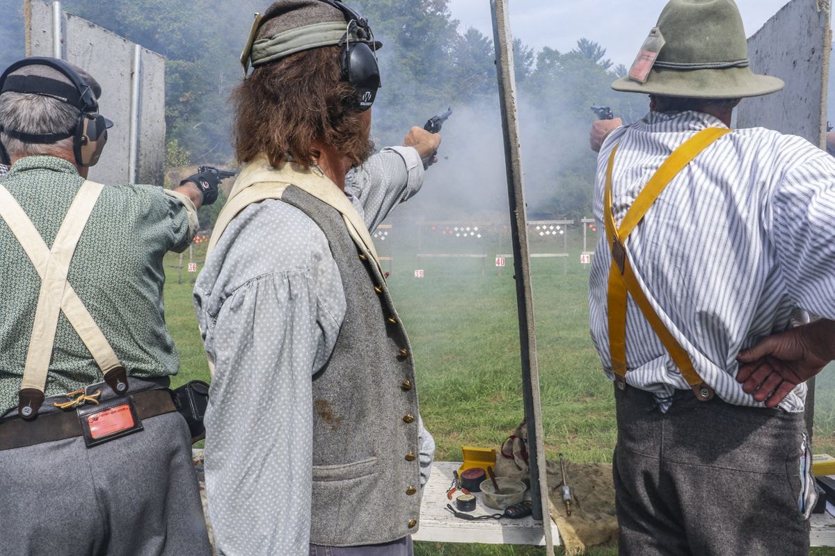 Members of the 8th Regiment Virginia Volunteer Infantry compete in the four-event revolver match on Friday morning. (Niki Bethke)