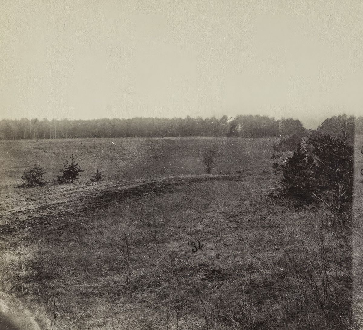 On May 5, 1864, Bartlett’s Brigade fought across the ground shown in this period photograph of Saunders Field at the Wilderness. (Library of Congress)