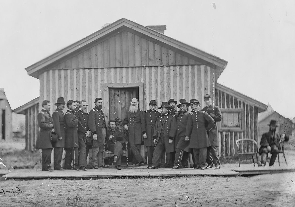 Gen. U.S. Grant and his staff were captured by Brady outside his headquarters hut in City Point, Va. — the same building depicted on the right in the sketch on the facing page.