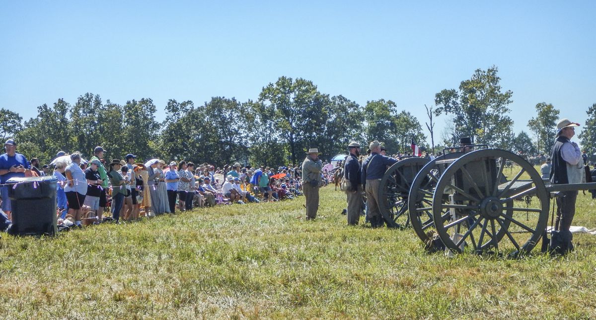 Some of spectators awaiting Confederate artillery action.