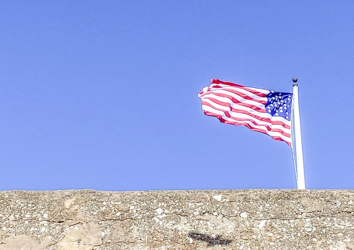 The United States flag flying above Fort Sumter.