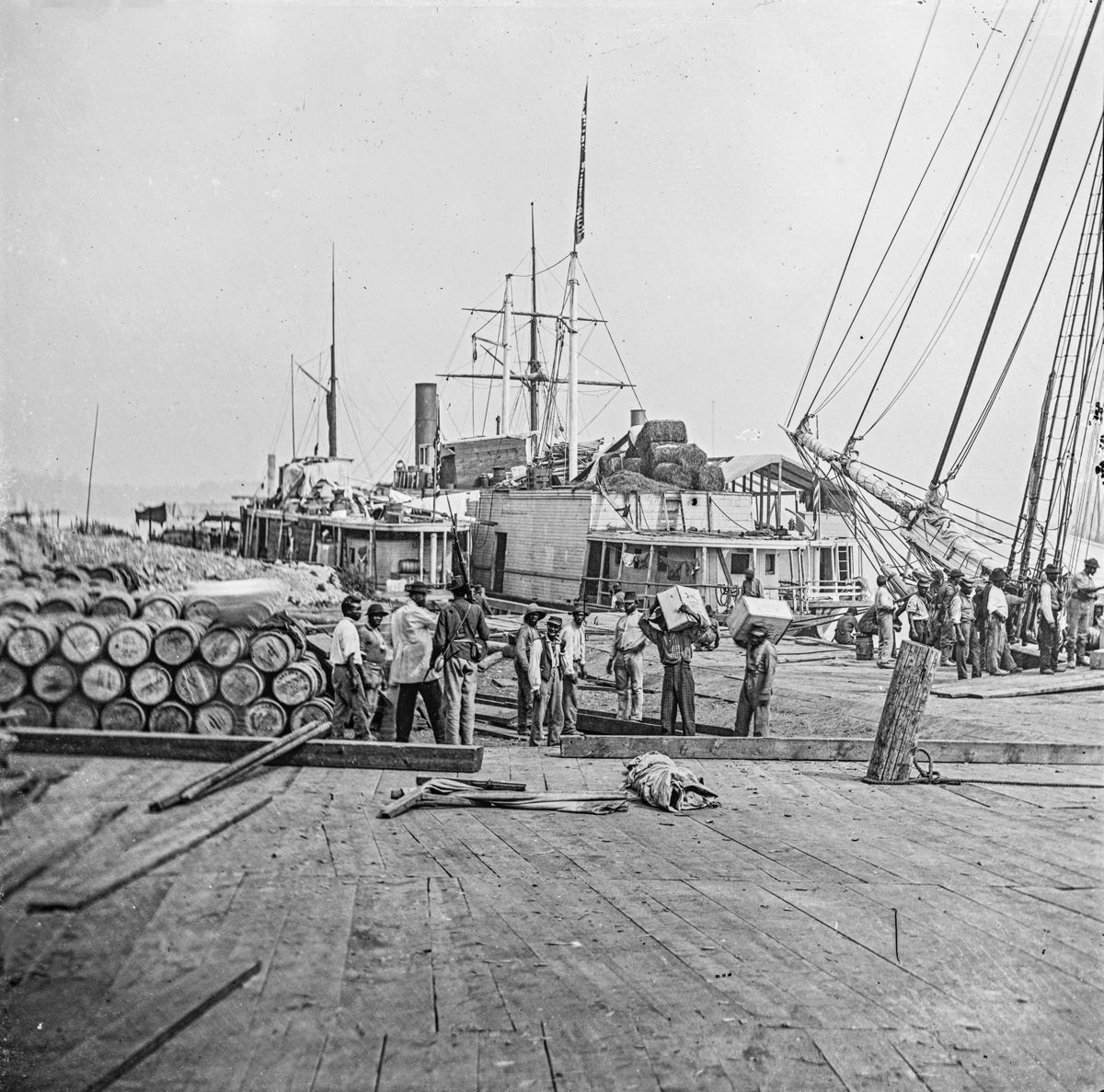 City Point, Va. African Americans unloading vessels at landing. (Library of Congress)
