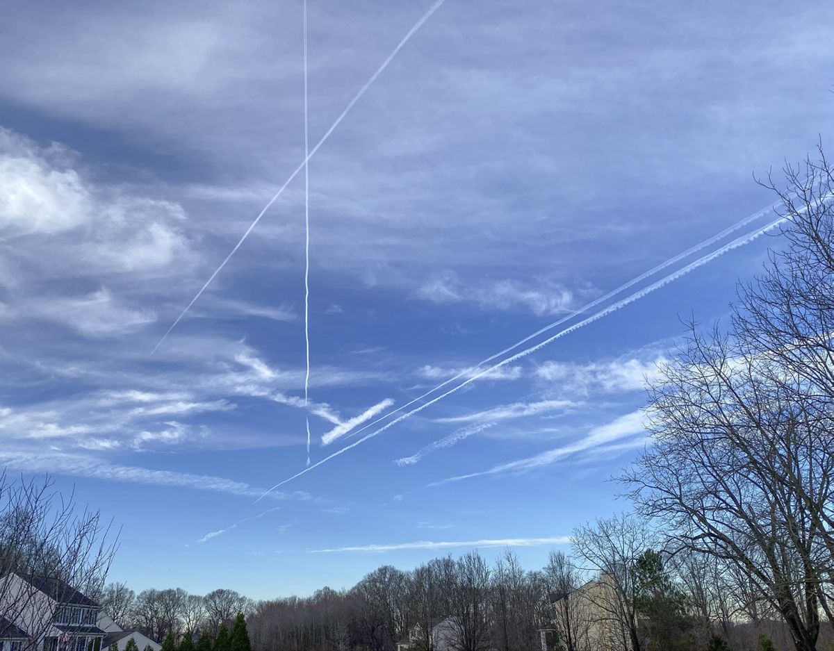 Jet trails crisscross the sky on a mid-December morning.