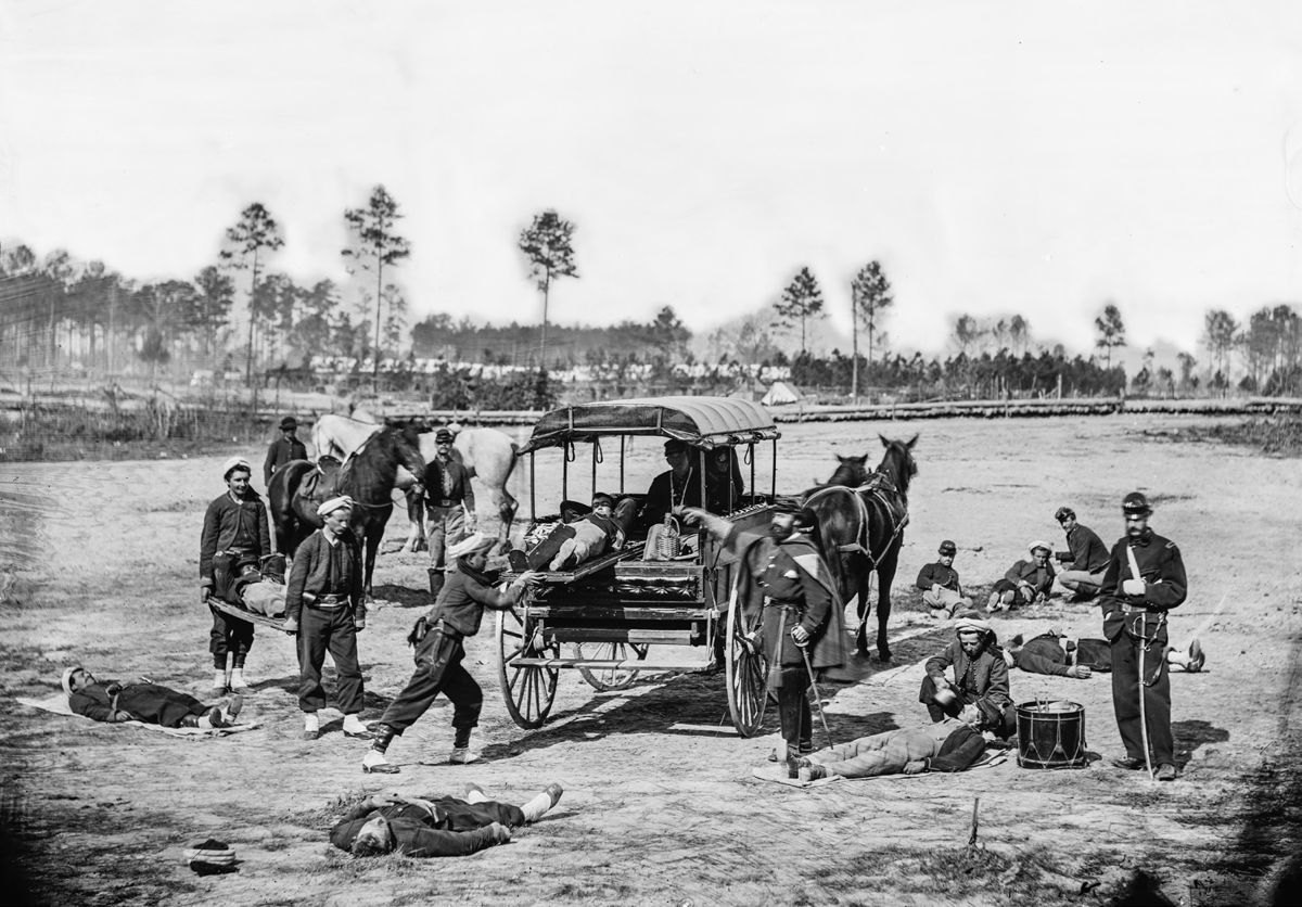 Zouave ambulance crew demonstrating removal of wounded soldiers from the field. Ambulances were used to transport wounded soldiers to field hospitals. Riding in an ambulance was often a grueling experience for a seriously wounded soldier. (Library of Congress) Civil War News Magazine | July-August 2024