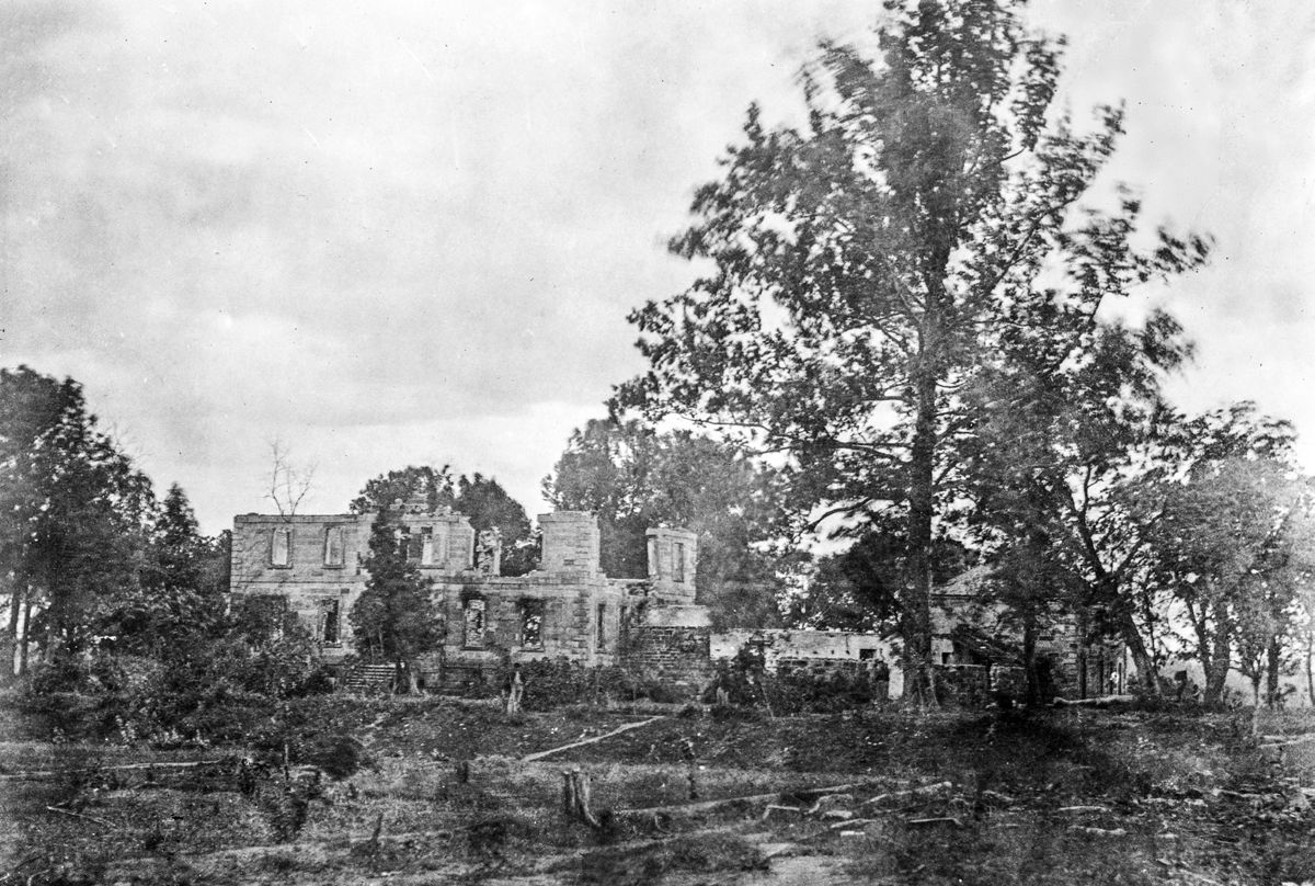 Mannsfield caught fire and burned early in 1863. This period photograph shows the ruins left behind. (Library of Congress)