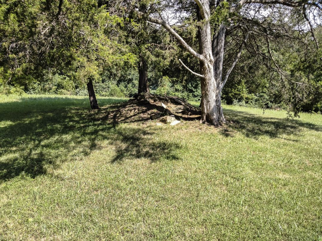 Today, all that remains of the Wilderness battlefield’s Higgerson House is some stone debris from the chimney. (Tim Talbott)