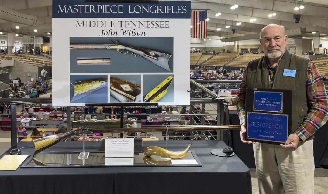 Collector, researcher, lecturer, and author Mel Hankla with his Best of Show Award.