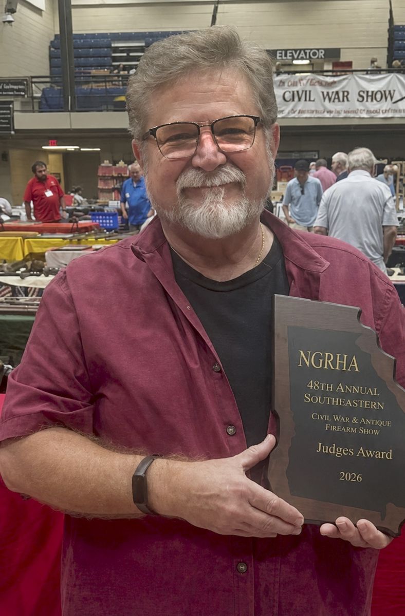Judges Award for Best Dealer Display: Tim Prince, College Hill Arsenal, for his display of Civil War weapons.