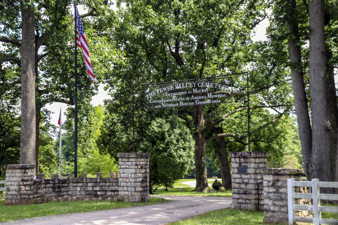 Entrance to the Pewee Valley and Kentucky Confederate Cemetery. The flagpole with the Kentucky and Confederate flags is visible to the left of the American flag. (All photos by Charles Bogart)