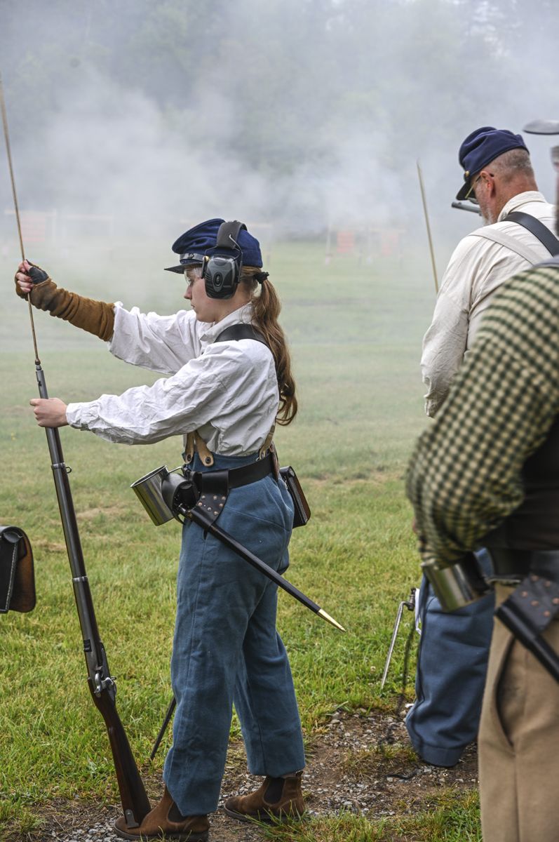 The 1st Wisconsin Infantry passed inspection and was added to the roster of N-SSA units at the 153rd Nationals. Here, a young lady skirmisher loads her Springfield as the unit competes in its first musket team match. (Lis Cole)
