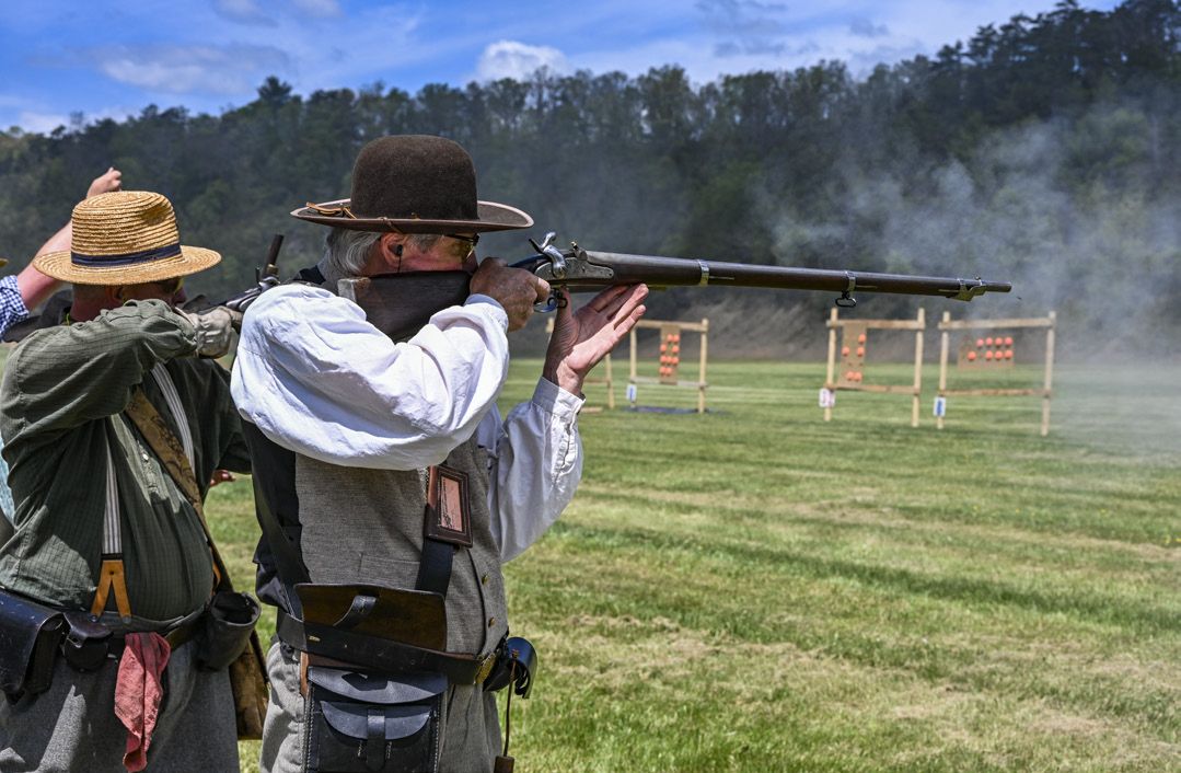A member of the 2nd Virginia Volunteer Infantry takes careful aim with his Model 1842 musket during the smoothbore musket match. His team placed first in the A-2 class by a close 1.7 seconds.